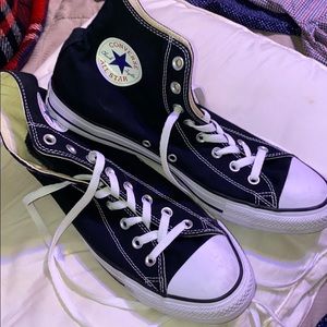 Black and white high top converse